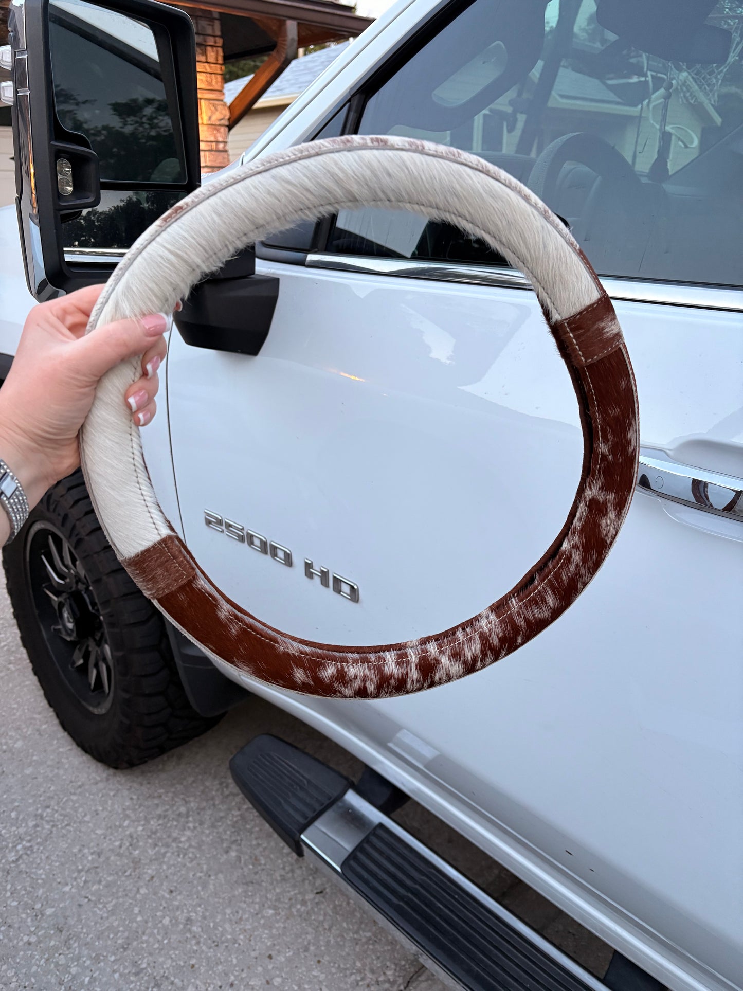 Brown and White Cowhide Steering Wheel Cover