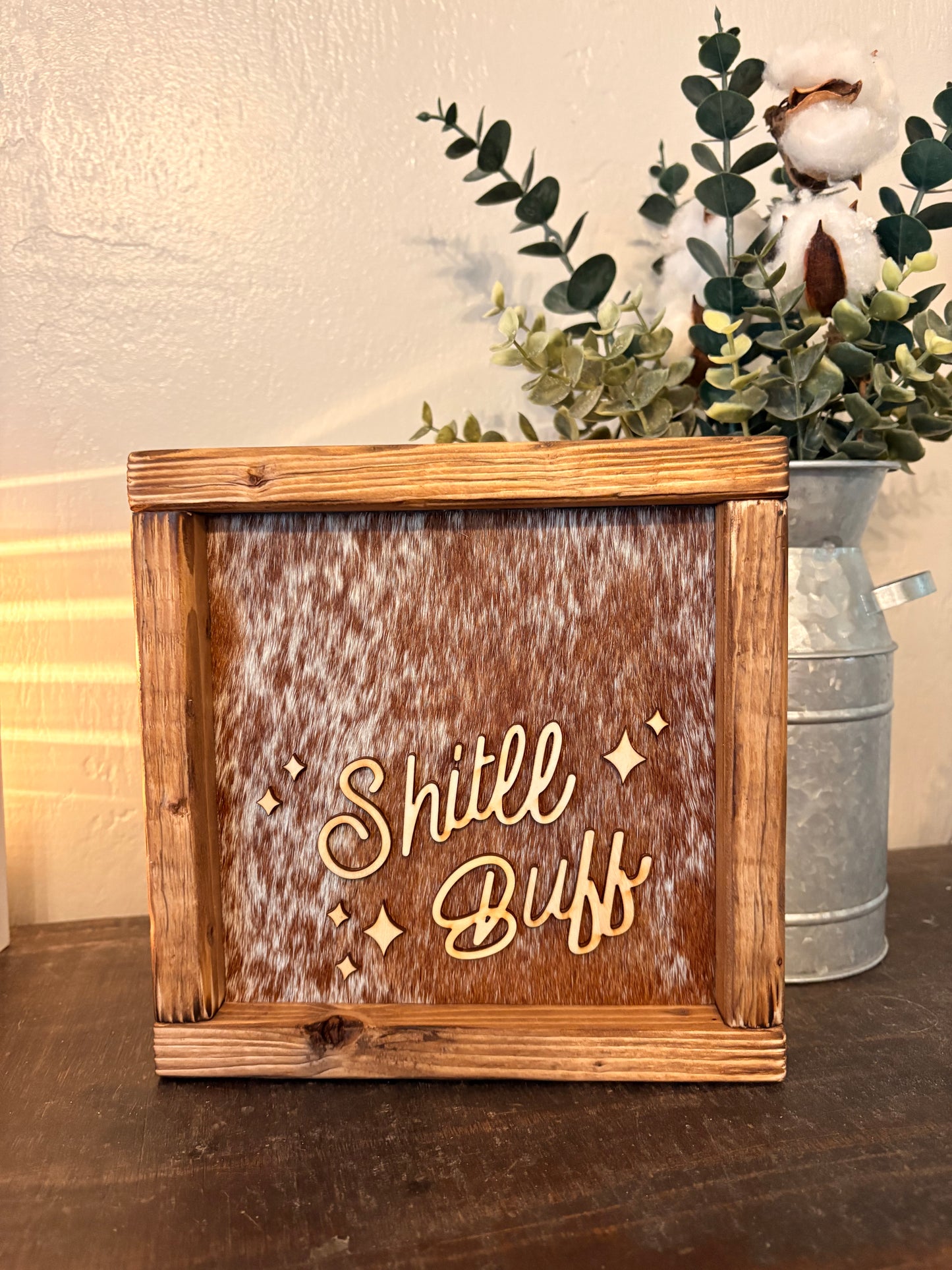 Shit'll Buff Cowhide Framed Sign