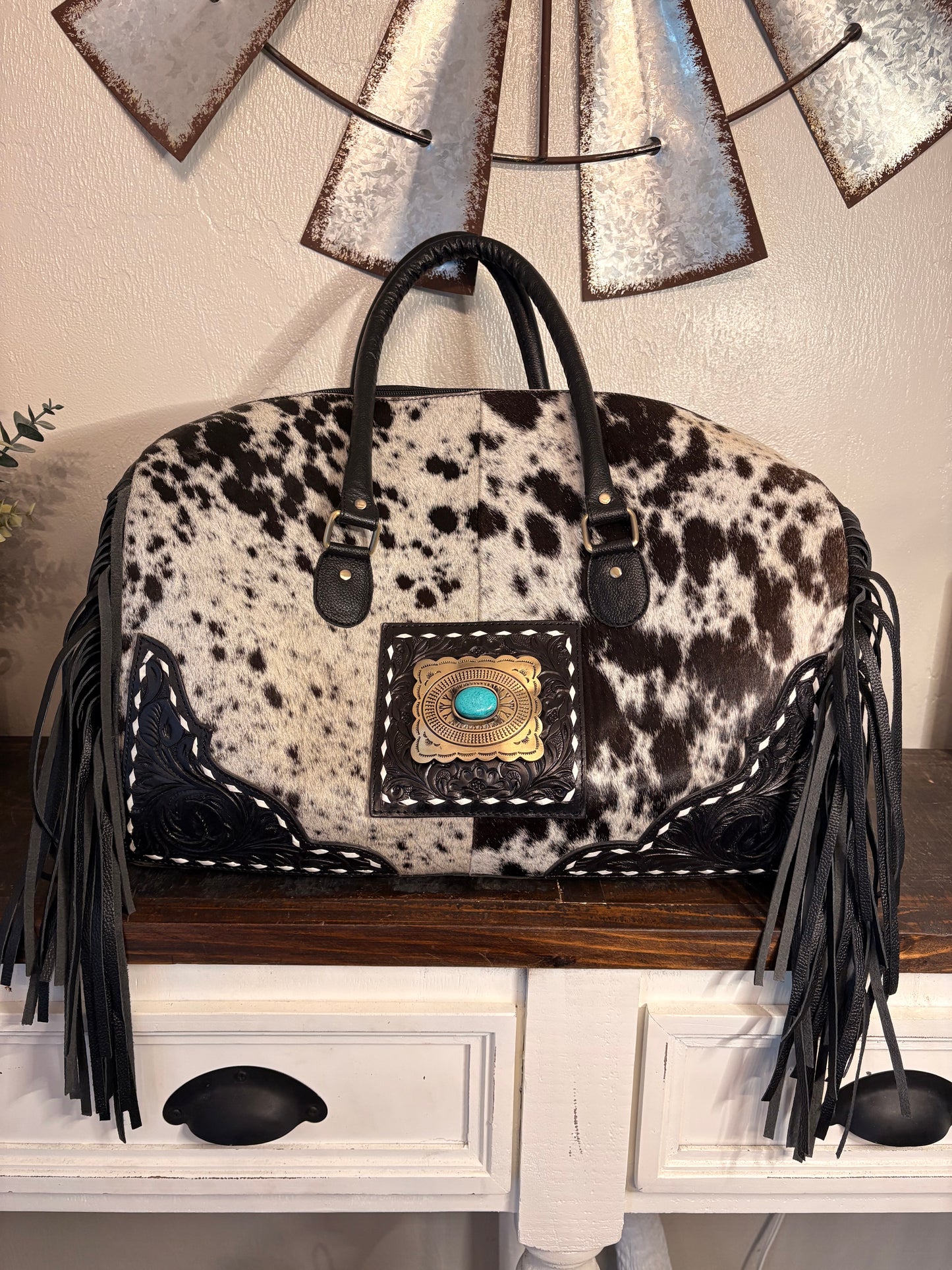 Black and White Cowhide Duffle Bag with Tooled Leather