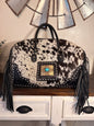 Black and White Cowhide Duffle Bag with Tooled Leather