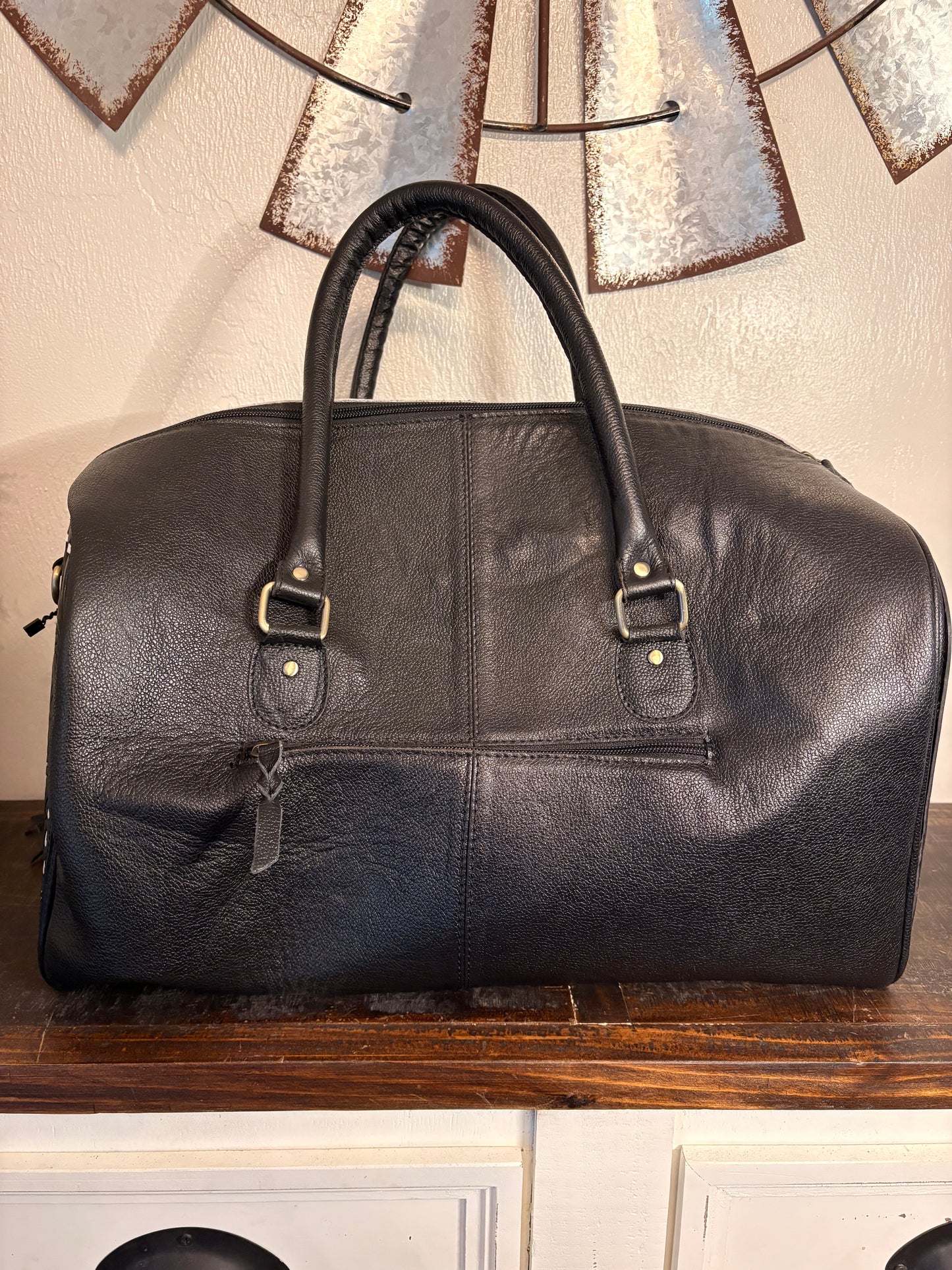 Black and White Cowhide Duffle Bag with Tooled Leather