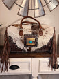 Brown and White Cowhide Duffle Bag with Tooled Leather