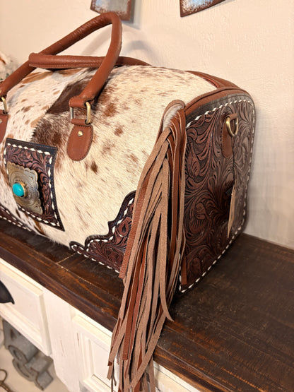Brown and White Cowhide Duffle Bag with Tooled Leather