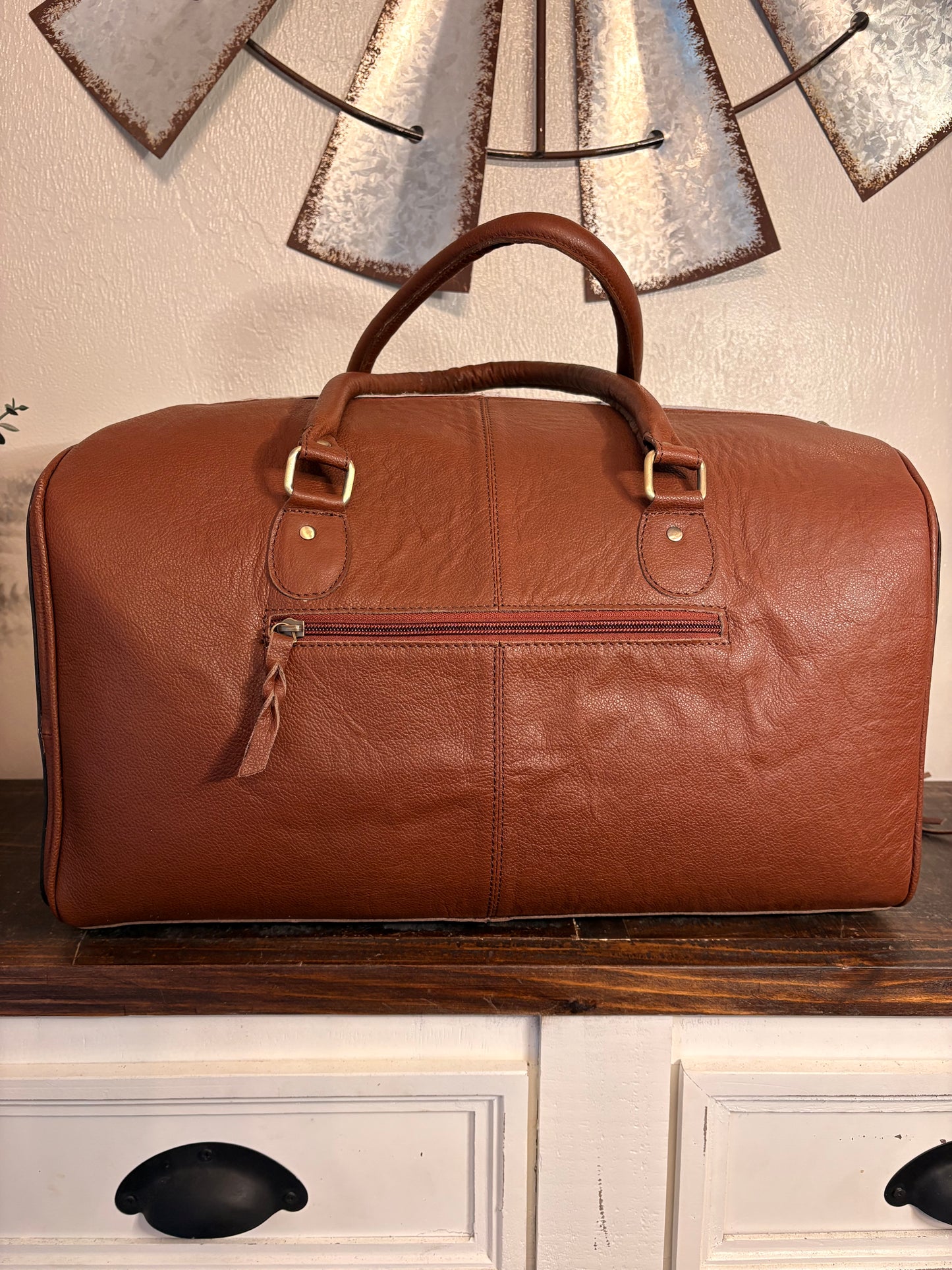 Brown and White Cowhide Duffle Bag with Tooled Leather