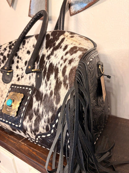 Black and White Cowhide Duffle Bag with Tooled Leather